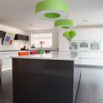 German engineered Hacker kitchen shown in pearl grey and polar white gloss with white cosmic and grey glitter quartz.